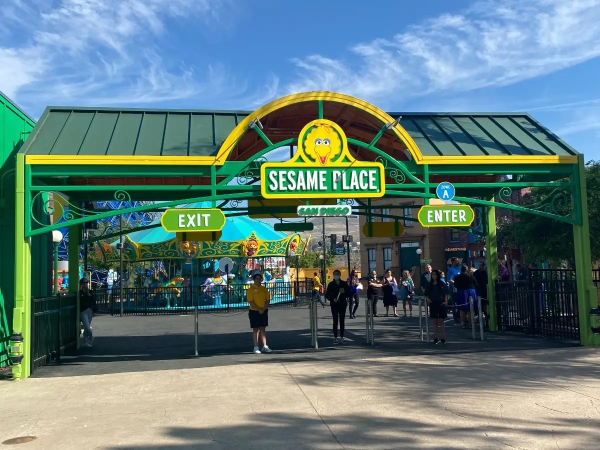 Sesame Place San Diego — entrance with Big Bird sign and colorful rides